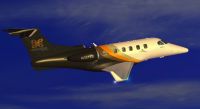 Executive Express Embraer Phenom 300 in flight.