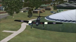 Screenshot of plane flying over Duxford Airfield Scenery.
