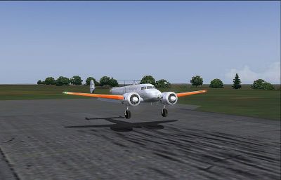 Screenshot of Lockheed L10E Electra landing on runway.
