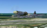 Screenshot of Spitfire in flight, firing guns.
