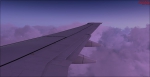 Descending into the clouds in London on a British Airways 737, clean configuration.