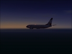 Flying over the Atlantic Ocean with a nice sunset